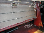 Part of the interior wiring harness located behind the front seat