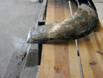 Right rear fender after welding in patch metal and smoothing dents