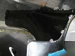 Back side with authentic semi-gloss black paint